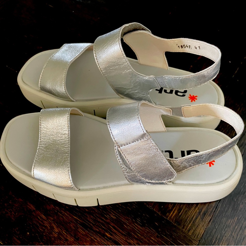 Never been worn, metallic silver platform sandals